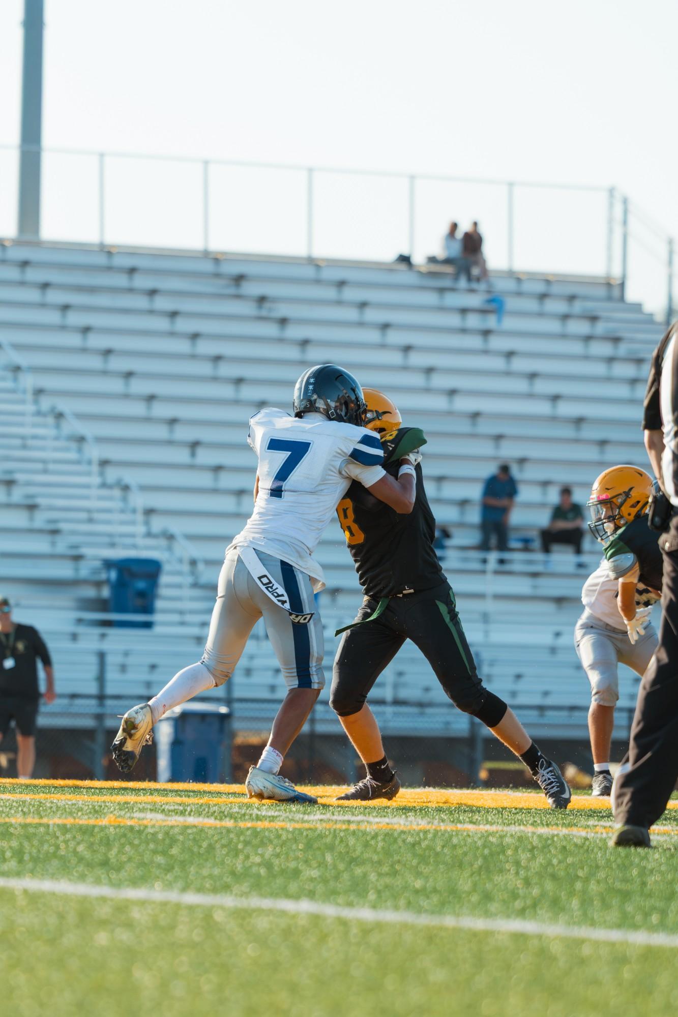 Freedom #7 tangles with a Castro Valley player