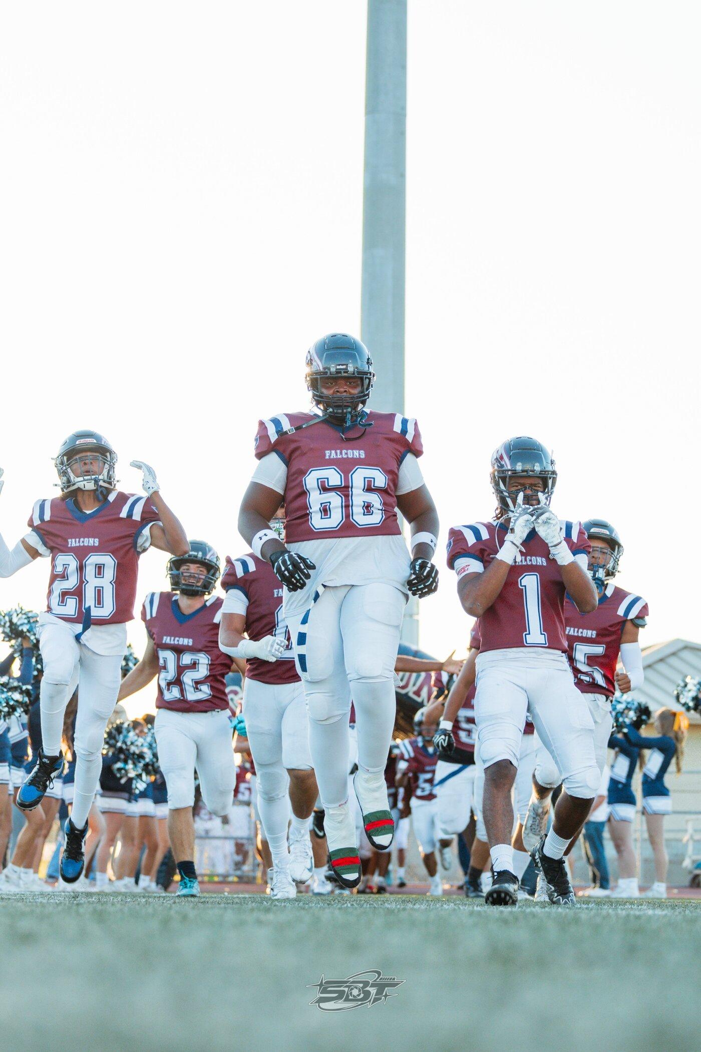 Freedom Falcons taking the field before kickoff