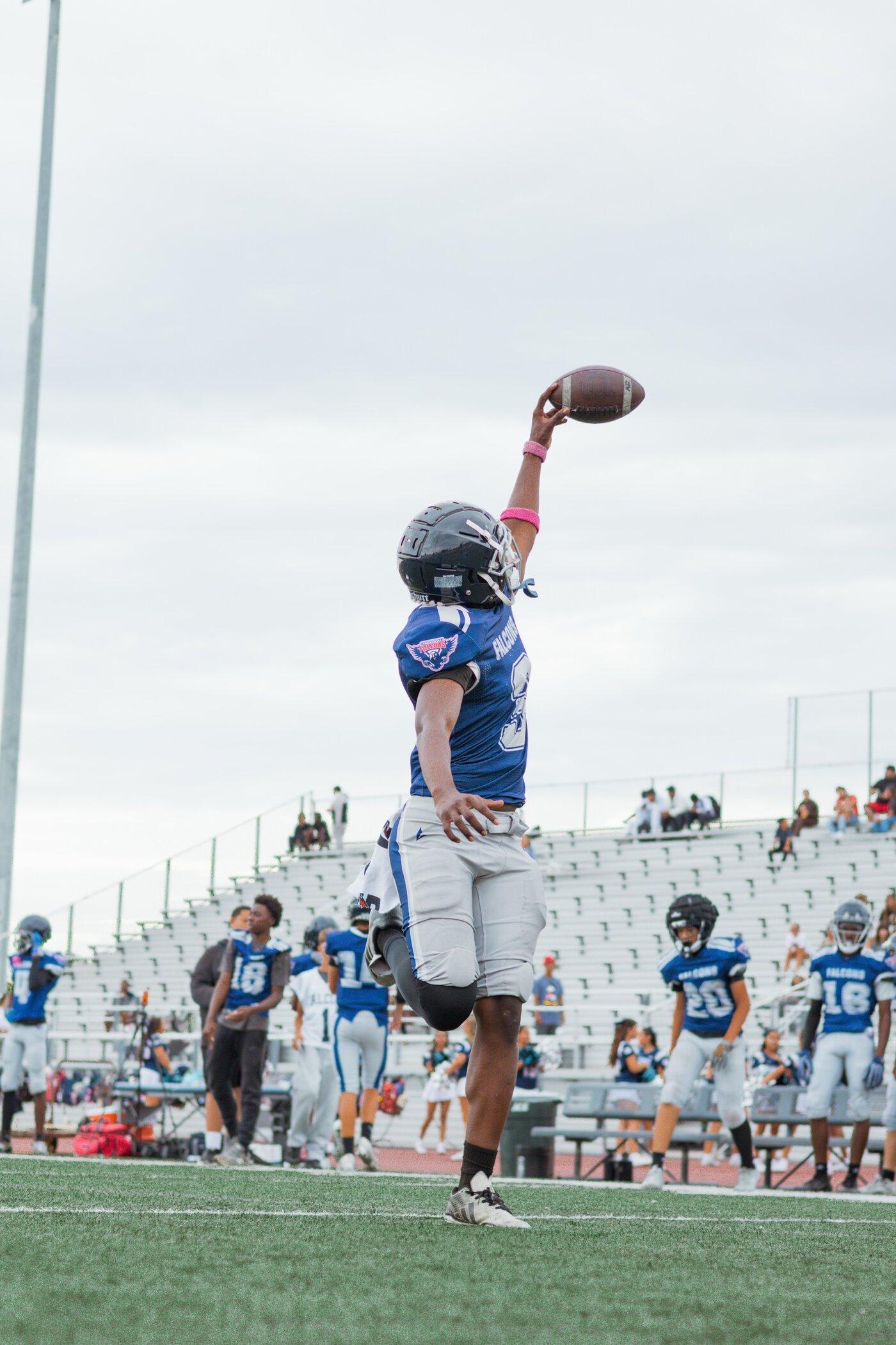Freedom JV player spiking the ball after a big play