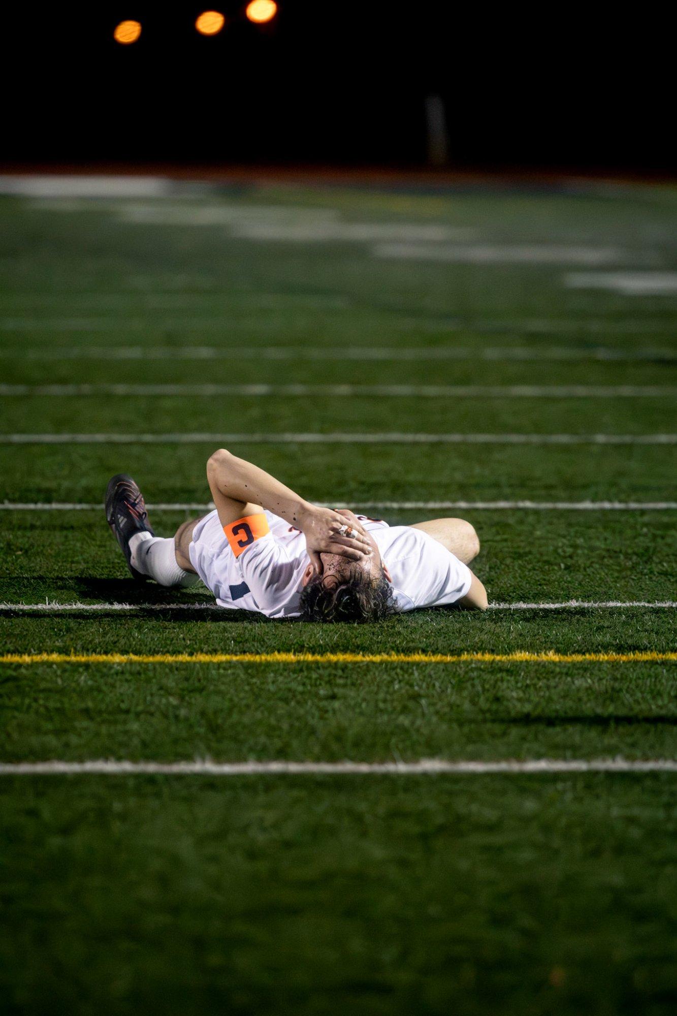 Pittsburg team captain on the ground during play
